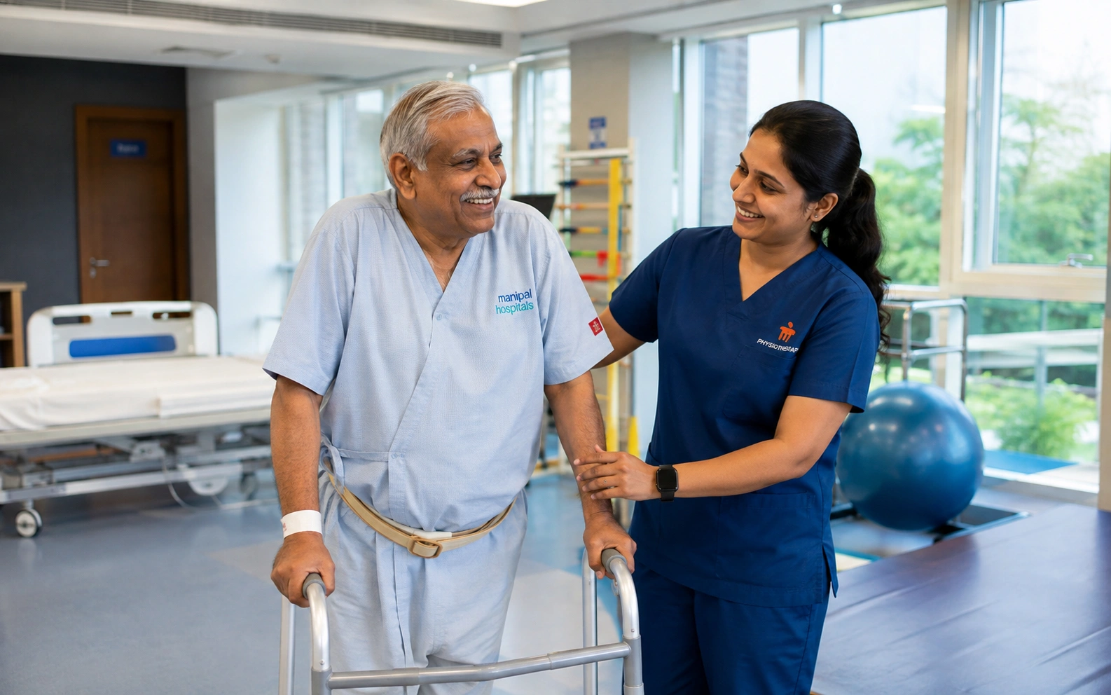 Dr. Atul Mishra, best joint replacement surgeon in Delhi, consulting a patient at ASIC Clinic