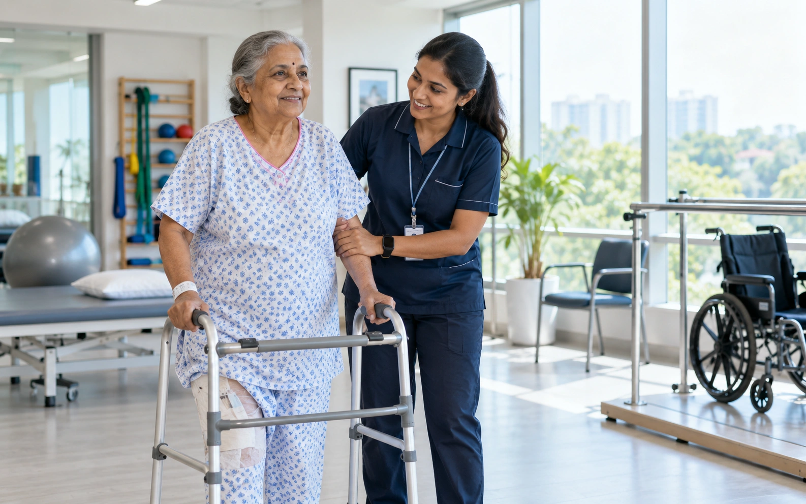 Patient walking with physiotherapist after robotic hip replacement in Delhi